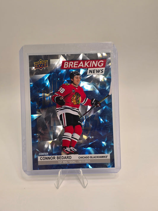 2024–25 Upper Deck — Breaking News (Blue & Silver) #BN-4 — Connor Bedard (1st NHL Goal Insert)
